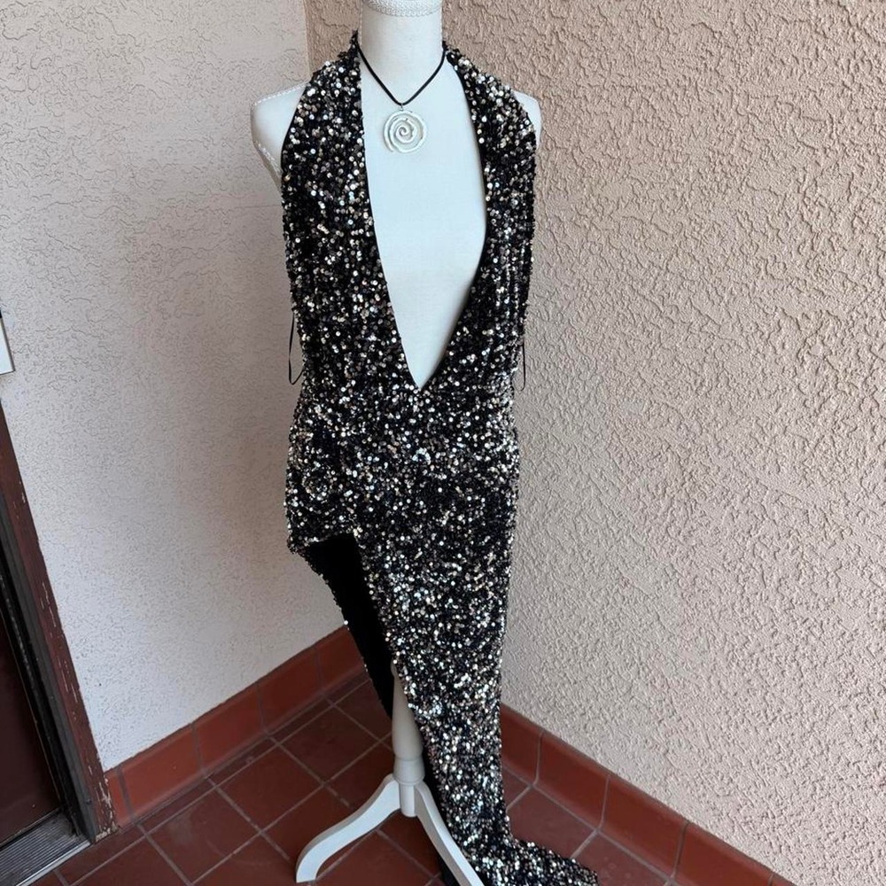 Black sequin maxi dress with low cut halter neck and low back